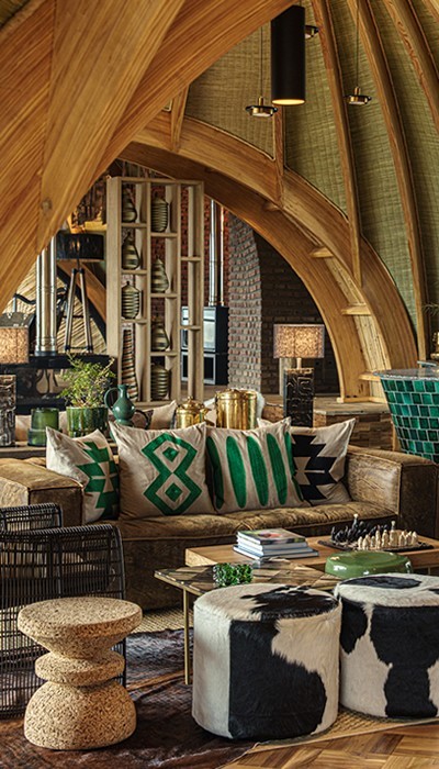 Compare luxury safari and gorilla trekking lodges in Rwanda and Uganda, from Bisate and Singita Kwitonda to Clouds and Ishasha.